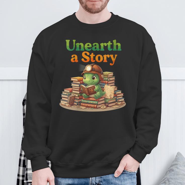 Women's Unearth a Story Summer 2026 Dinosaur Reading Books Dino Sweatshirt Gifts for Old Men