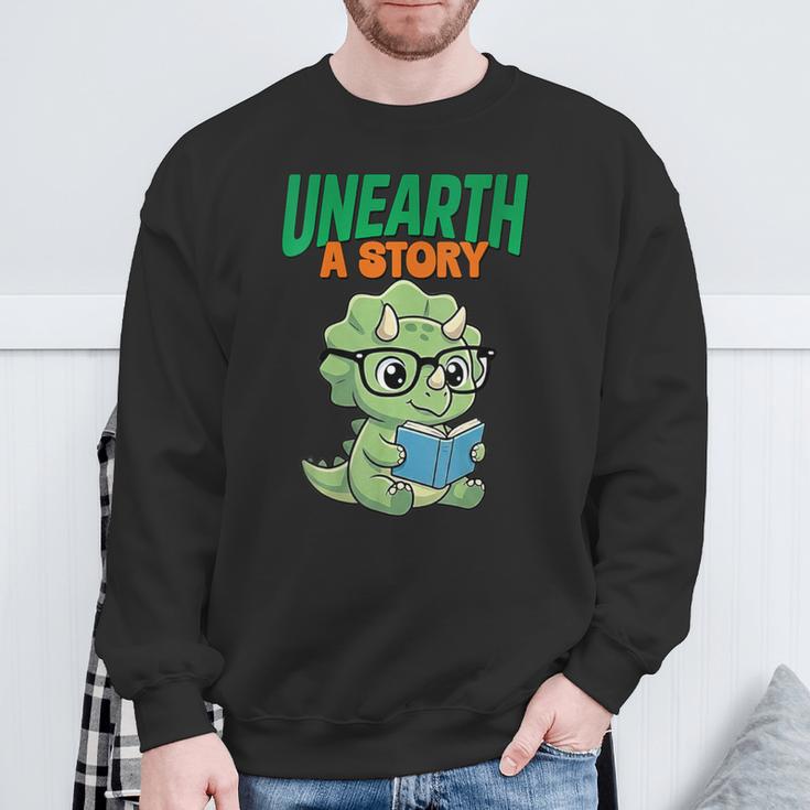 Women's Unearth a Story Summer Reading 2026 Triceratops Dino Book Sweatshirt Gifts for Old Men