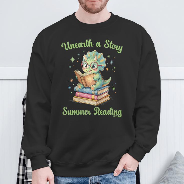 Women's Unearth a Story Triceratops Dinosaur Reading Books Cute Dino Sweatshirt Gifts for Old Men