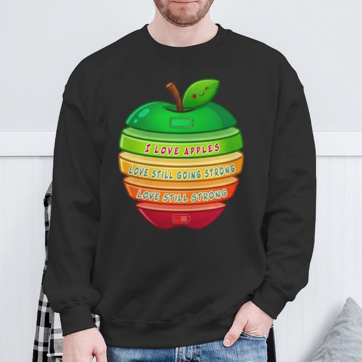 リンゴの力シリーズ リンゴのエネルギー リンゴ スライス 充電 バッテリー 残量 おもしろみ ユニーク 長袖tシャツ スウェットシャツ 高齢者への贈り物