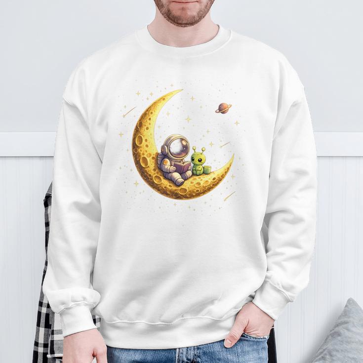 Astronaut Reading Book To Alien Moon Space Astronomy Sweatshirt Gifts for Old Men