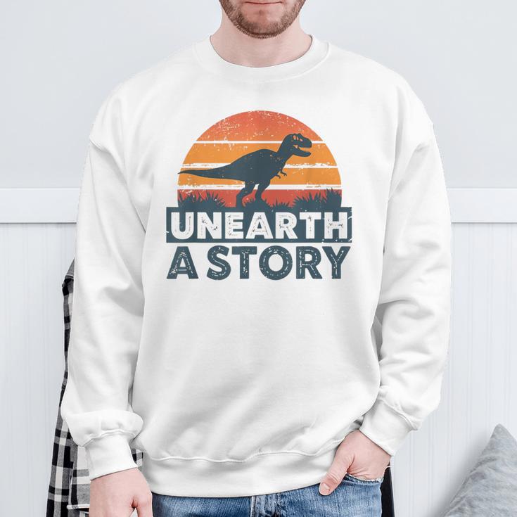 Unearth A Story Dinosaur Reader Book Lover 2026 Sweatshirt Gifts for Old Men