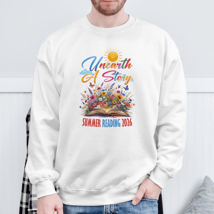 Unearth A Story Reading Book Flowers Summer Reading 2026 Sweatshirt Gifts for Old Men Unearth A Story Reading Book Flowers Summer Reading 2026 Sweatshirt Gifts for Old Men