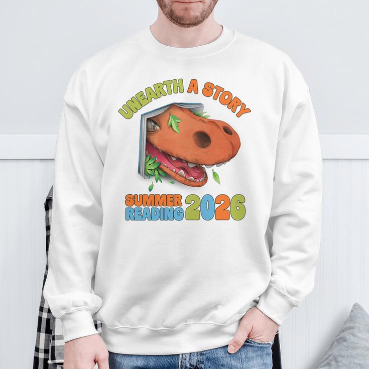Unearth A Story Summer Reading 2026 Dinosaur Book Lover Dino Premium Tri-Blend Sweatshirt Gifts for Old Men