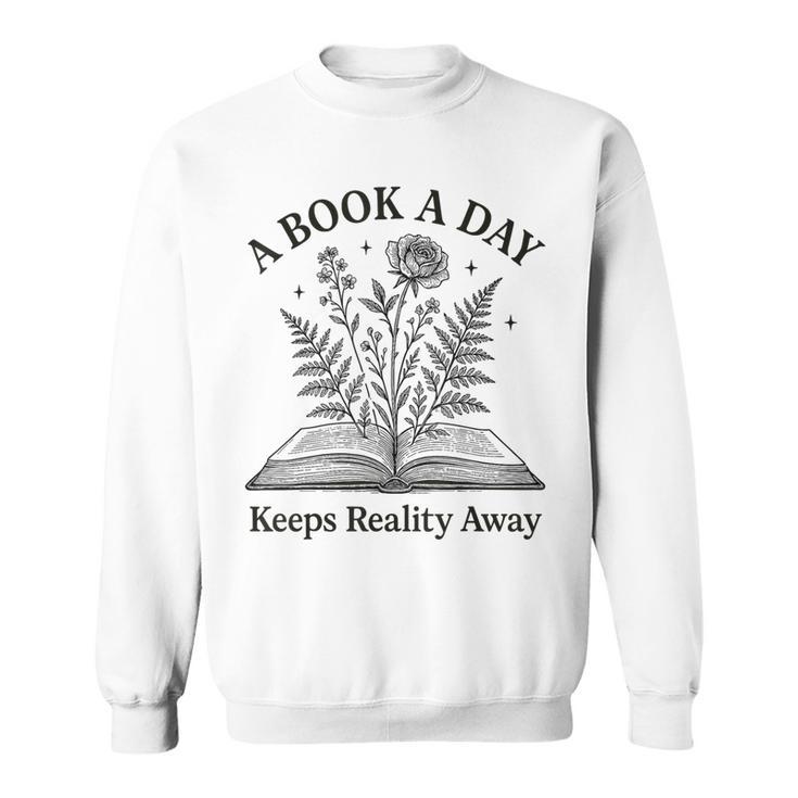 A Book A Day Keeps Reality Away Floral Reader Sweatshirt