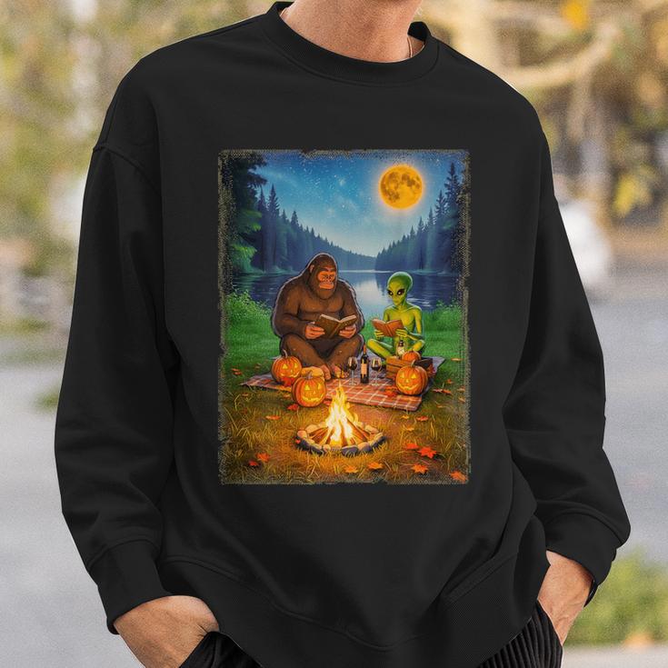 Bigfoot And Alien Reading Books Campfire Halloween Sweatshirt Gifts for Him