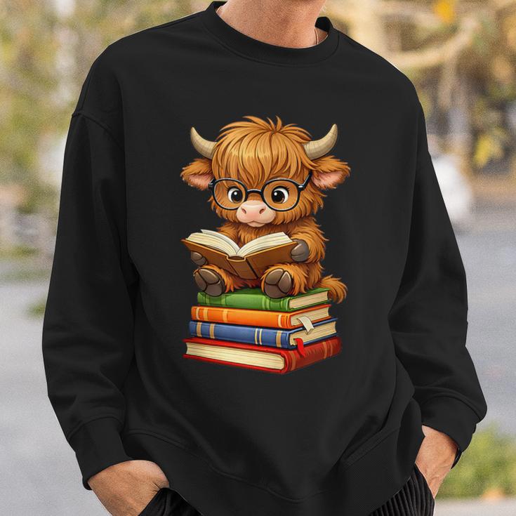 Cute Highland Cow With Glasses Reading Books Sweatshirt Gifts for Him