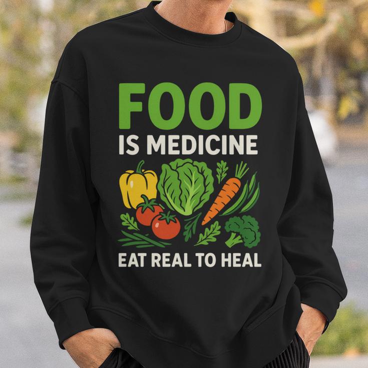 Food Is Medicineの栄養士、自然療法医栄養士へのギフト 長袖tシャツ スウェットシャツ 彼への贈り物