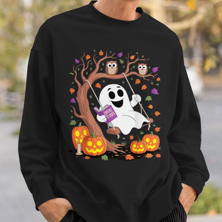 Ghost Reading Book On Swing Halloween Autumn Art Sweatshirt Gifts for Him