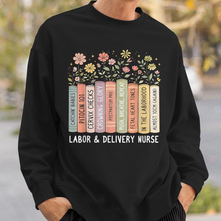Labor And Delivery Nurse Book Wildflower Mother Baby Nursing Sweatshirt Gifts for Him Labor And Delivery Nurse Book Wildflower Mother Baby Nursing Sweatshirt Gifts for Him