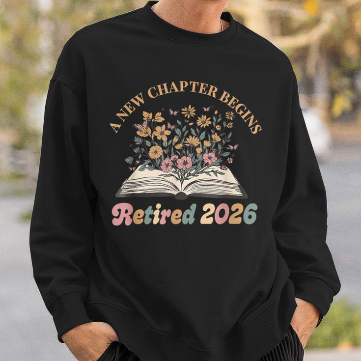 A New Chapter Begins Retirement Floral Book Retired 2026 Sweatshirt Gifts for Him