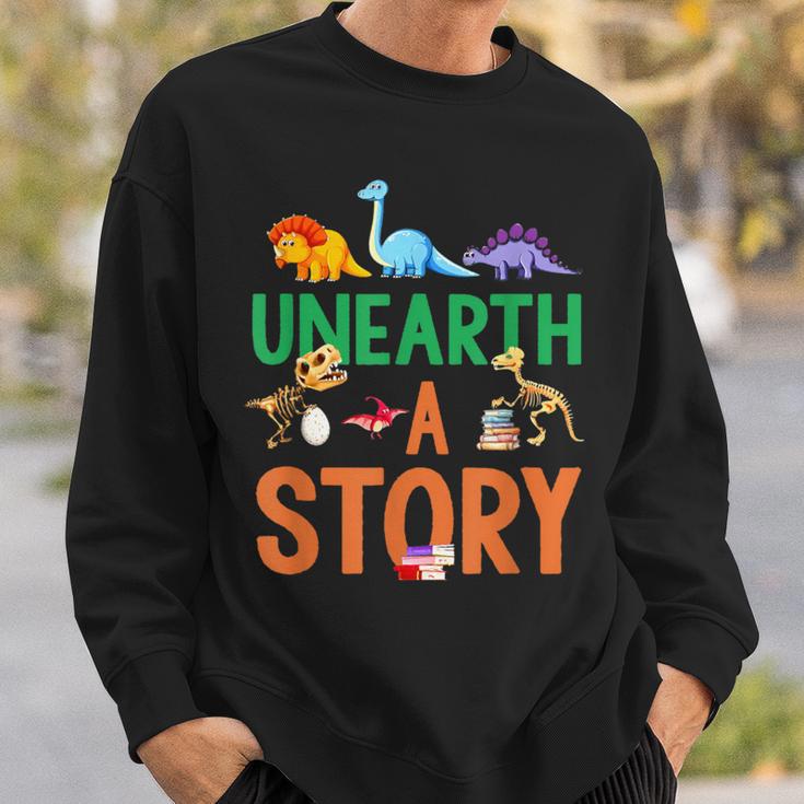 Summer Reading 2026 Dinosaurs Book Lover Unearth A Story Sweatshirt Gifts for Him Summer Reading 2026 Dinosaurs Book Lover Unearth A Story Sweatshirt Gifts for Him