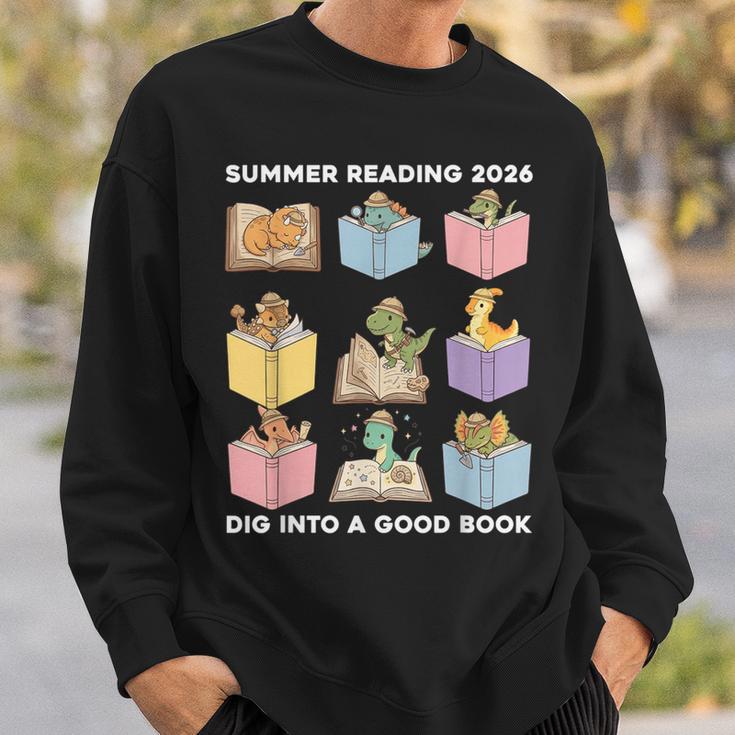 Summer Reading 2026 Unearth A Story Dinosaur Books Readers Sweatshirt Gifts for Him