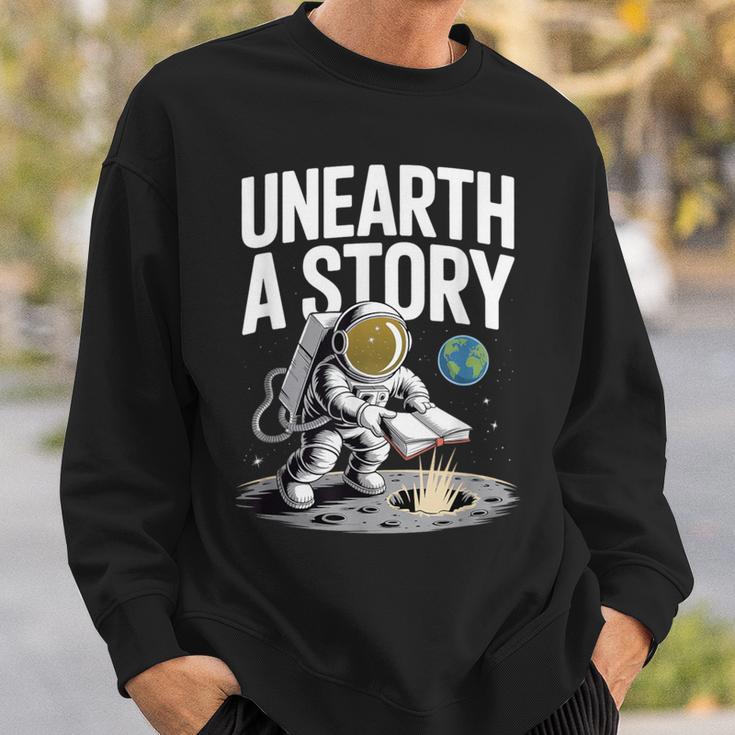 Unearth A Story Astronaut Finds Book On The Moon Sweatshirt Gifts for Him