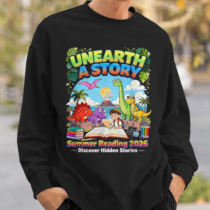 Unearth A Story Dinosaur Books Summer Reading 2026 Sweatshirt Gifts for Him