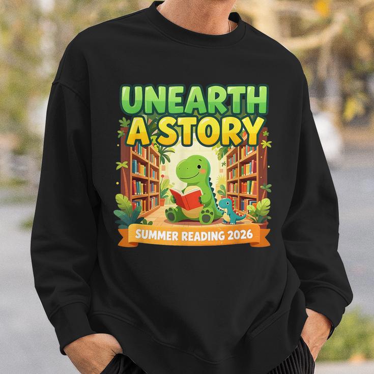 Unearth A Story Dinosaur Summer Reading 2026 Books Sweatshirt Gifts for Him