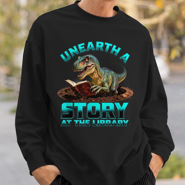 Unearth A Story At The Library Dinosaur Reading Sweatshirt Gifts for Him