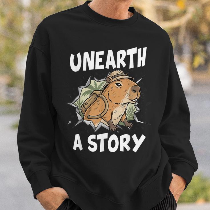 Unearth A Story Summer Reading Program 2026 Capybara Book Sweatshirt Gifts for Him