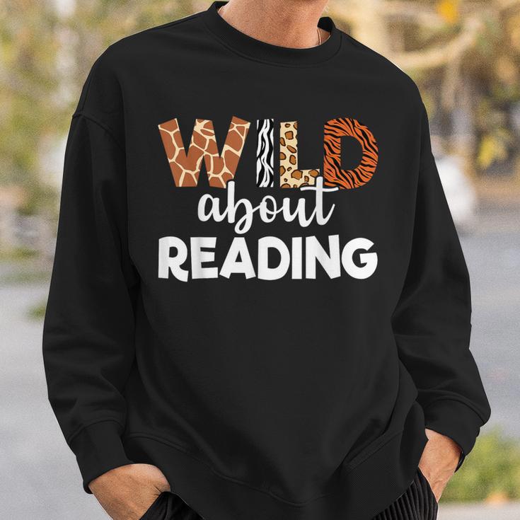 Wild About Reading Teacher Reading Books Back To School Sweatshirt Gifts for Him