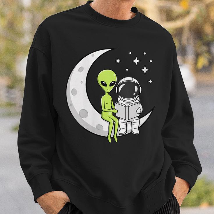 Women's Alien And Astronaut Reading On Moon Kids Sci Fi Book Sweatshirt Gifts for Him