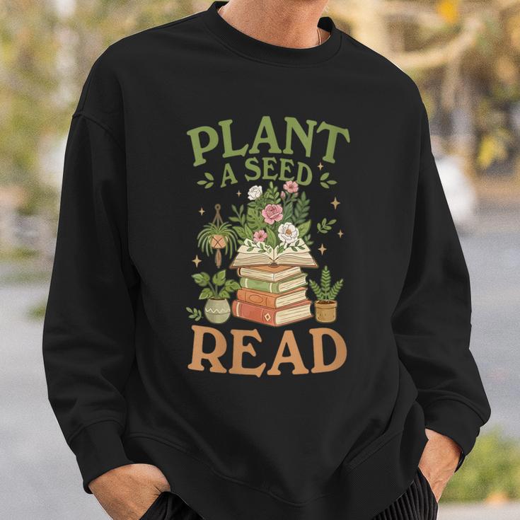 Women's Plant A Seed Read Summer Reading 2026 Teacher Librarian Book Sweatshirt Gifts for Him Women's Plant A Seed Read Summer Reading 2026 Teacher Librarian Book Sweatshirt Gifts for Him