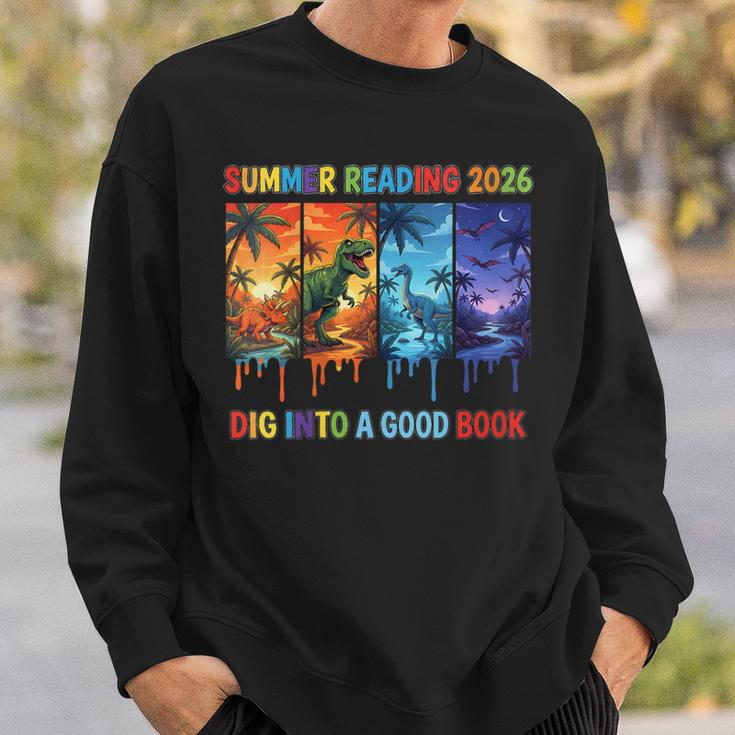 Women's Summer Reading 2026 Unearth A Story Dinosaur Books Sweatshirt Gifts for Him
