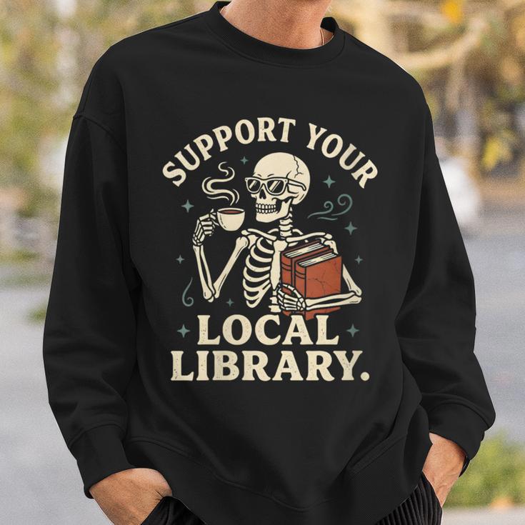 Women's Support Your Local Library Skeleton Reading Books Librarian Sweatshirt Gifts for Him