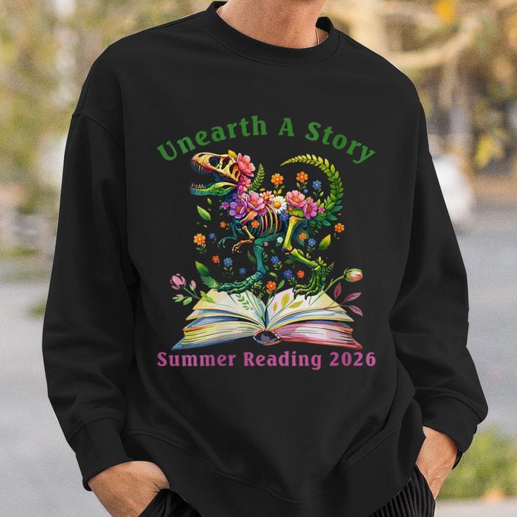Women's Unearth A Story Summer Reading 2026 Dinosaur Book Floral Sweatshirt Gifts for Him
