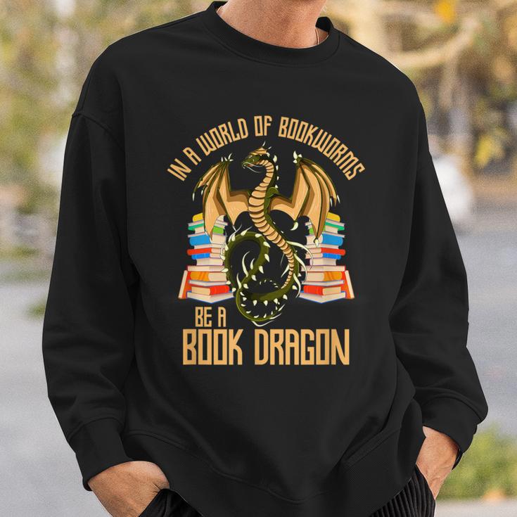 In A World Of Bookworms Be A Book Dragon Sweatshirt Gifts for Him