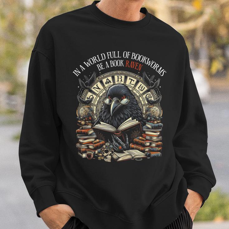 In A World Full Of Bookworms Be A Book Raven Reader Reading Sweatshirt Gifts for Him