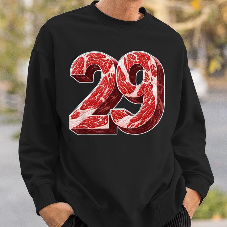「29」肉 にく ニク 豚肉 牛肉 食べ物 肉食 ダジャレ 美食 焼肉 29 二九 ケトジェニック・ダイエット 数字 スウェットシャツ 彼への贈り物
