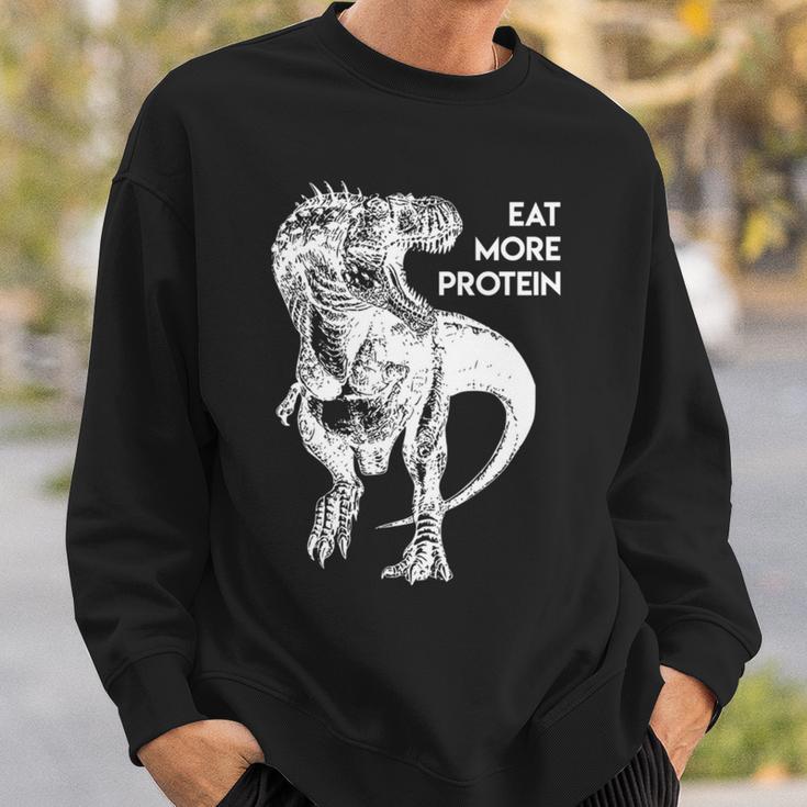 ハングリー・ダイナソー 肉食 肉食恐竜 Tレックスもっとタンパク質を食べる 高タンパク食 フィットネス 長袖tシャツ スウェットシャツ 彼への贈り物