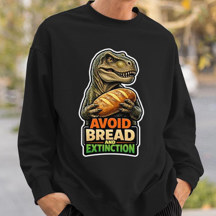 パンと絶滅を避ける恐竜ケトユーモア。 長袖tシャツ スウェットシャツ 彼への贈り物