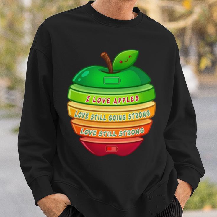 リンゴの力シリーズ リンゴのエネルギー リンゴ スライス 充電 バッテリー 残量 おもしろみ ユニーク 長袖tシャツ スウェットシャツ 彼への贈り物