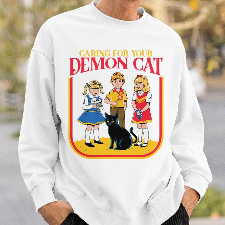 Caring For Your Evil Cat Retro Dark Humor Book Cover Premium Tri-Blend Sweatshirt Gifts for Him Caring For Your Evil Cat Retro Dark Humor Book Cover Premium Tri-Blend Sweatshirt Gifts for Him
