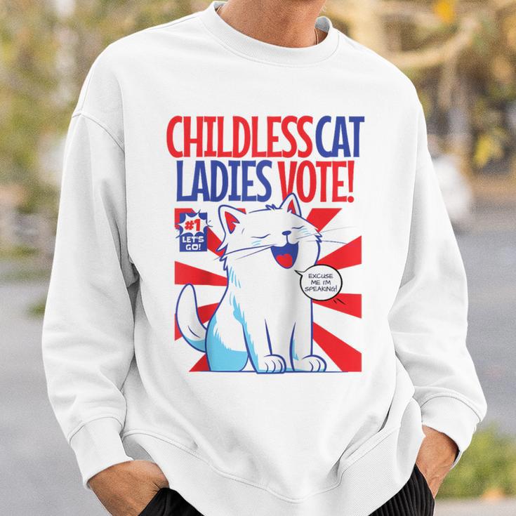 Childless Cat Ladies Vote Kamala Harris Cute Comic Book Cat Raglan Baseball Tee Sweatshirt Gifts for Him