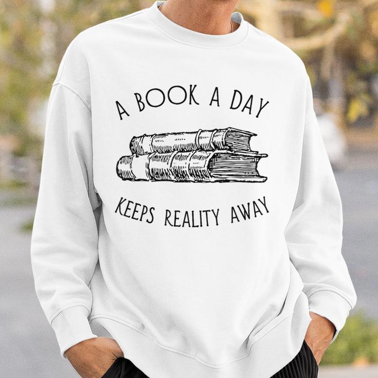 Fun Novel Reader Tee A Book A Day Keeps Reality Away Shirt Sweatshirt Gifts for Him Fun Novel Reader Tee A Book A Day Keeps Reality Away Shirt Sweatshirt Gifts for Him