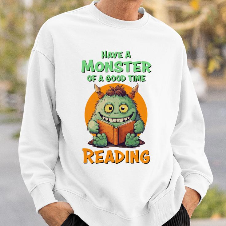 Halloween Teacher Librarian Monster Reading Books Performance Sweatshirt Gifts for Him Halloween Teacher Librarian Monster Reading Books Performance Sweatshirt Gifts for Him