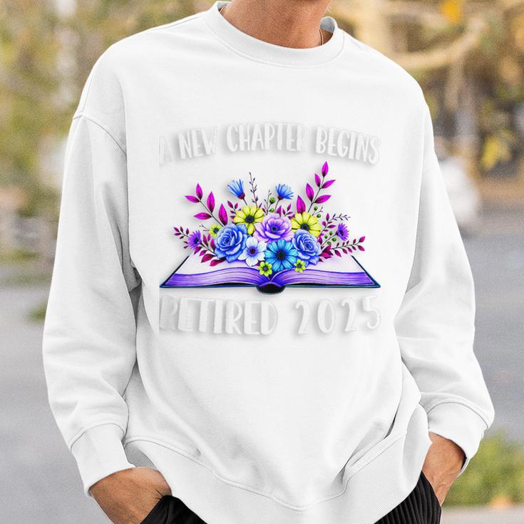 A New Chapter Begins Retired 2025 Floral Book Retirement Sweatshirt Gifts for Him A New Chapter Begins Retired 2025 Floral Book Retirement Sweatshirt Gifts for Him