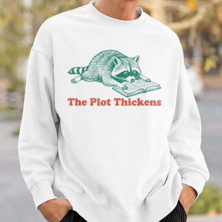 The Plot Thickens Bookish Raccoon Fantasy Book Reader Sweatshirt Gifts for Him The Plot Thickens Bookish Raccoon Fantasy Book Reader Sweatshirt Gifts for Him