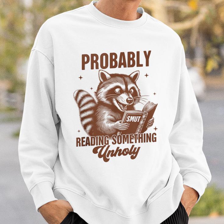 Smut Book Reader Racoon Probably Reading Something Unholy Sweatshirt Gifts for Him Smut Book Reader Racoon Probably Reading Something Unholy Sweatshirt Gifts for Him