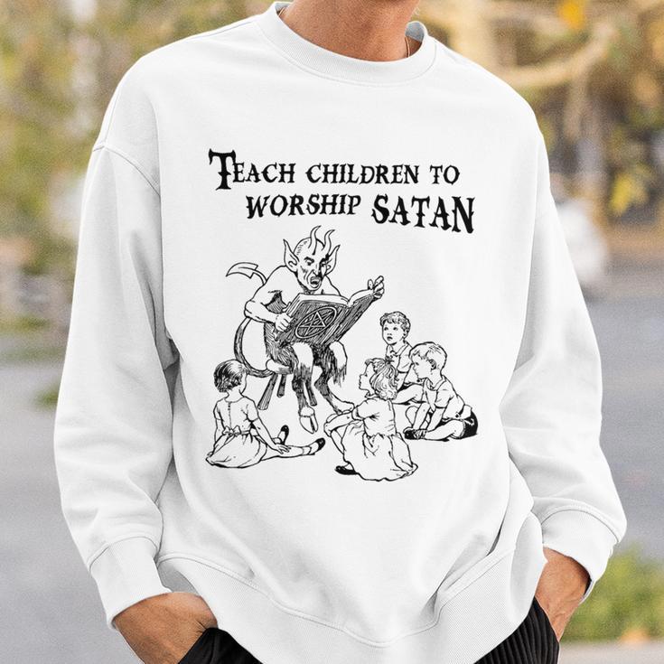 Teach Children To Worship Satan Satanic Demon Devil Book Sweatshirt Gifts for Him Teach Children To Worship Satan Satanic Demon Devil Book Sweatshirt Gifts for Him