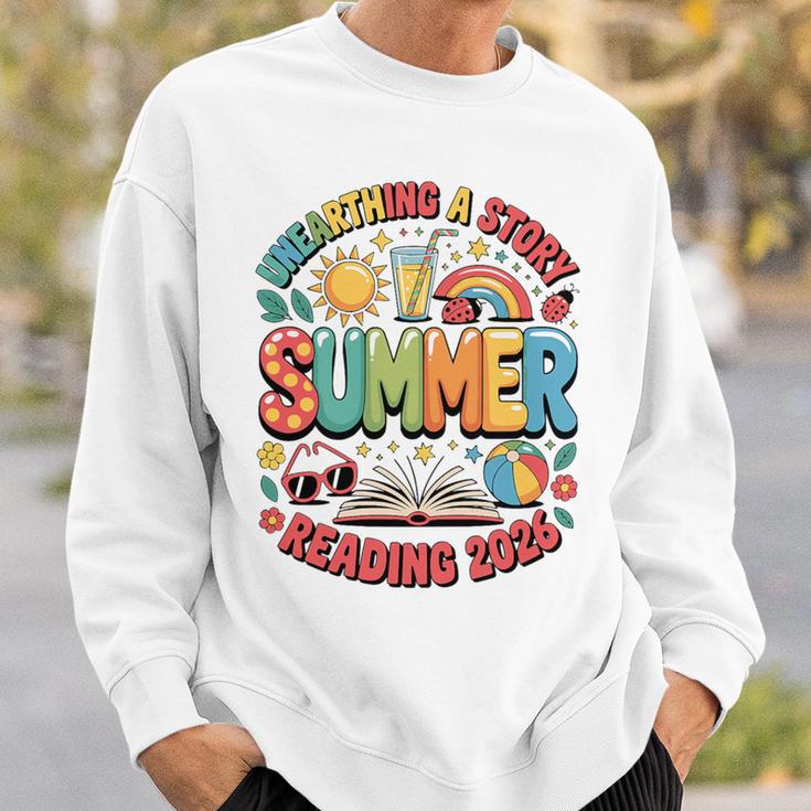 Unearth a Story Summer 2026 Summer Reading Program Book Premium Tri-Blend Sweatshirt Gifts for Him