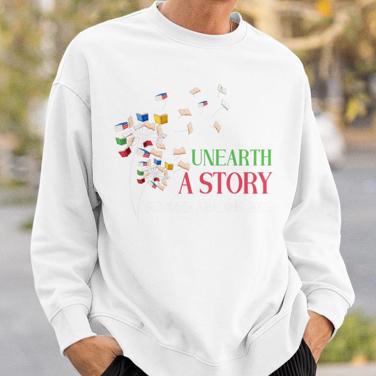 Unearth a Story Summer Reading 2026 Dandelion Books Readers Premium Tri-Blend Sweatshirt Gifts for Him