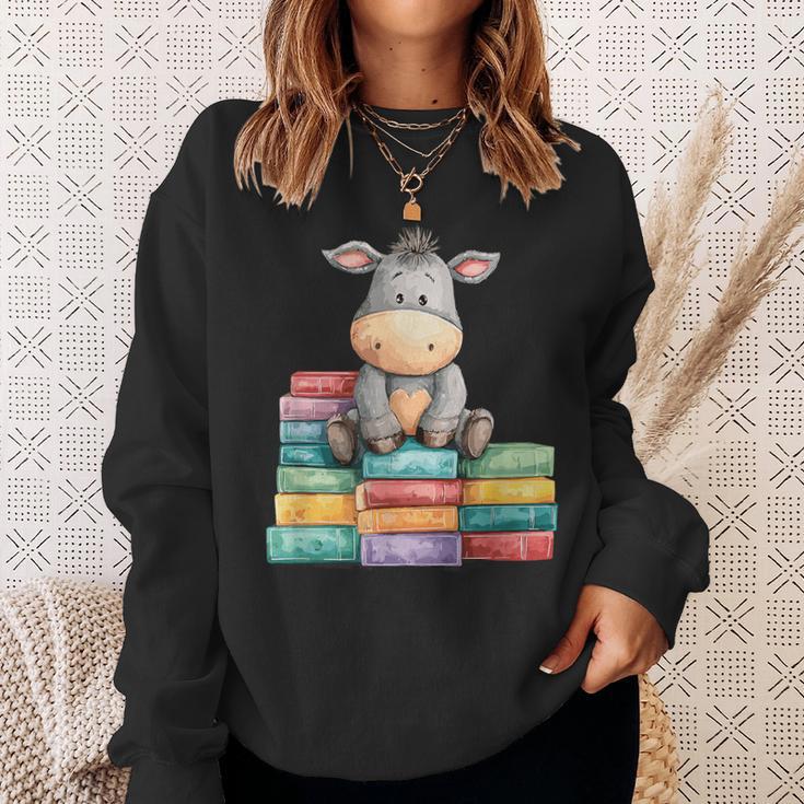 Adorable Donkey With Heart Sitting On Colorful Book Stack Sweatshirt Gifts for Her