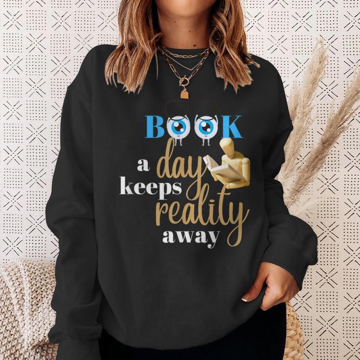 A Book A Day Keeps Reality Away Keep Your Day Dream Sweatshirt Gifts for Her