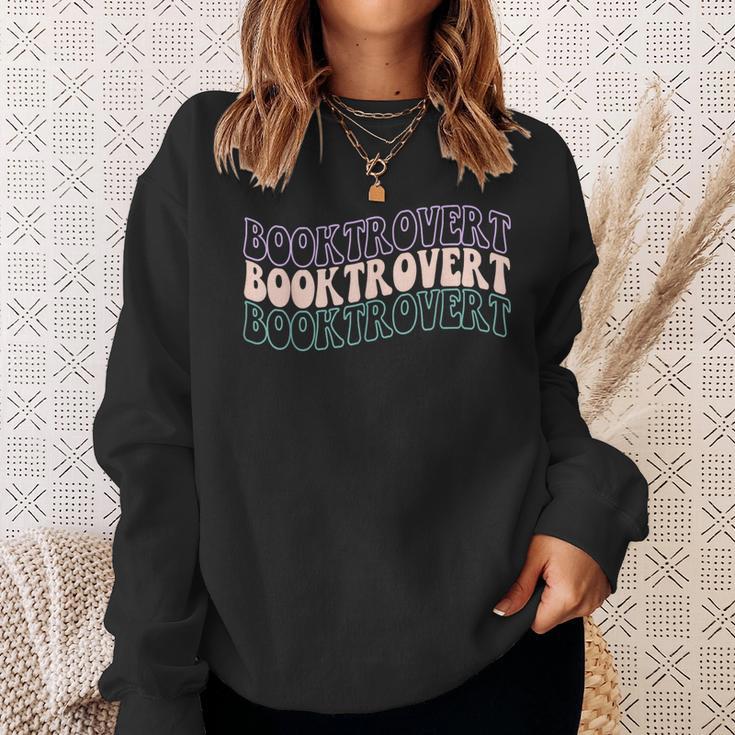 Booktrovert Groovy Read Books Avoid People & I Know Things Sweatshirt Gifts for Her