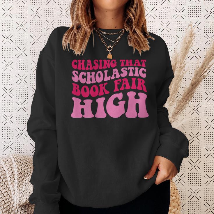 Chasing That Scholastic Book Fair High Sweatshirt Gifts for Her