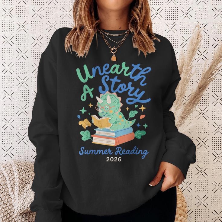 Cute Unearth a Story Triceratops Dinosaur Reading Books Dino Sweatshirt Gifts for Her Cute Unearth a Story Triceratops Dinosaur Reading Books Dino Sweatshirt Gifts for Her