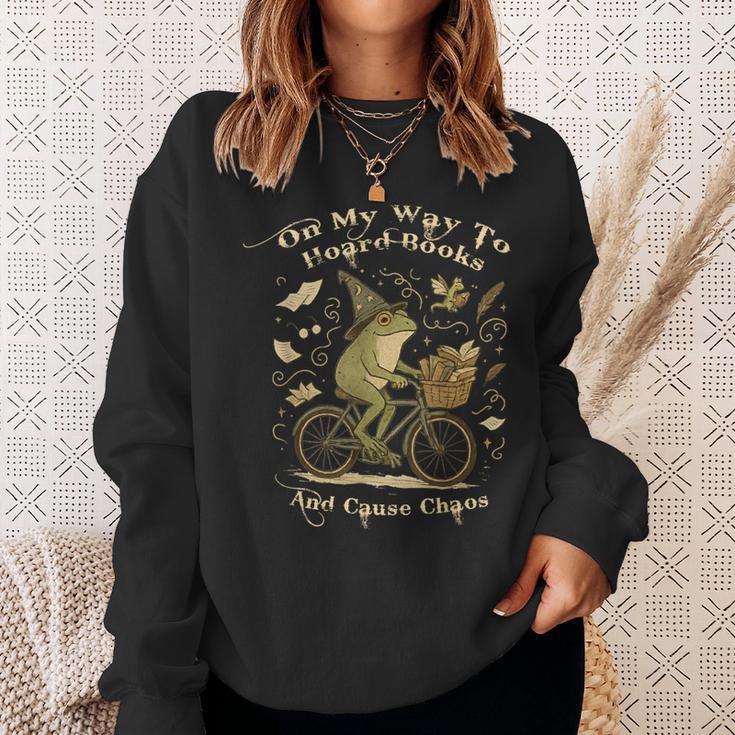 On My Way To Hoard Books And Cause Chaos Tom Foolery Frog Sweatshirt Gifts for Her